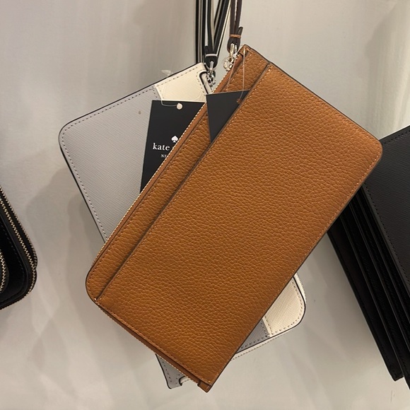 Kate Spade Medium Lucy L-Zip Wristlet Pebble Leather 
COLOR
Warm Gingerbread
NWT - Picture 16 of 16